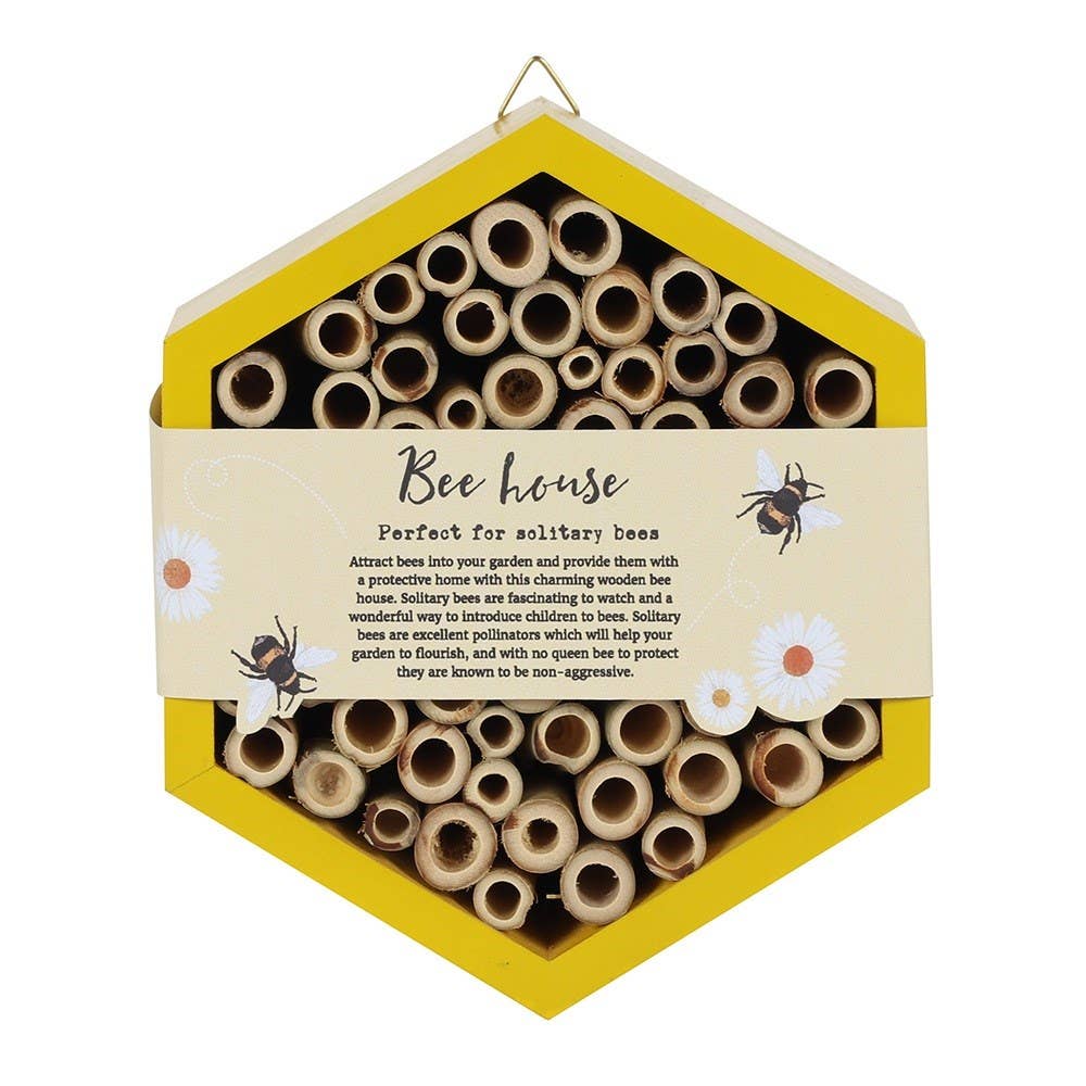 Hexagonal bee house with wooden tubes and yellow border on a white background
