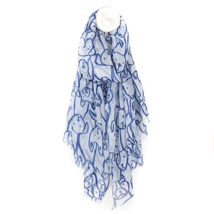 Blue and white patterned scarf on a white background