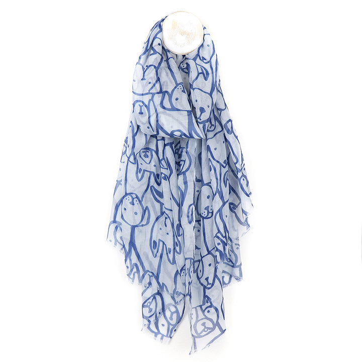 Blue and white patterned scarf on a white background