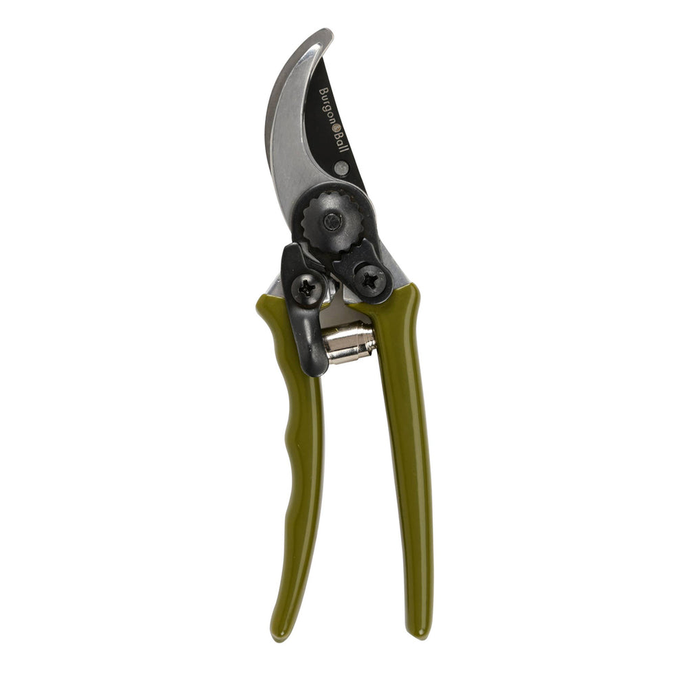 Pruning shears with green handles on a white background