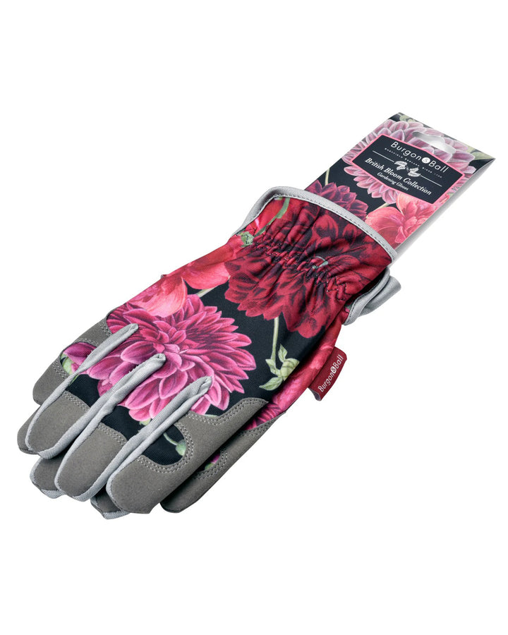 Floral gardening glove with brand label on a white background