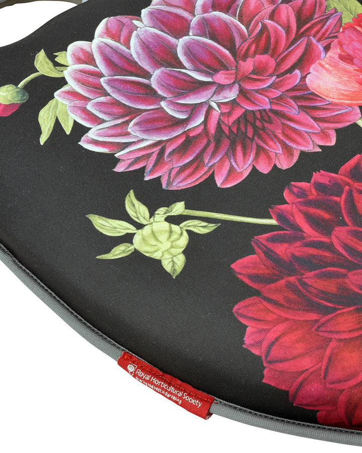 Floral-patterned product with a visible brand tag on a black background