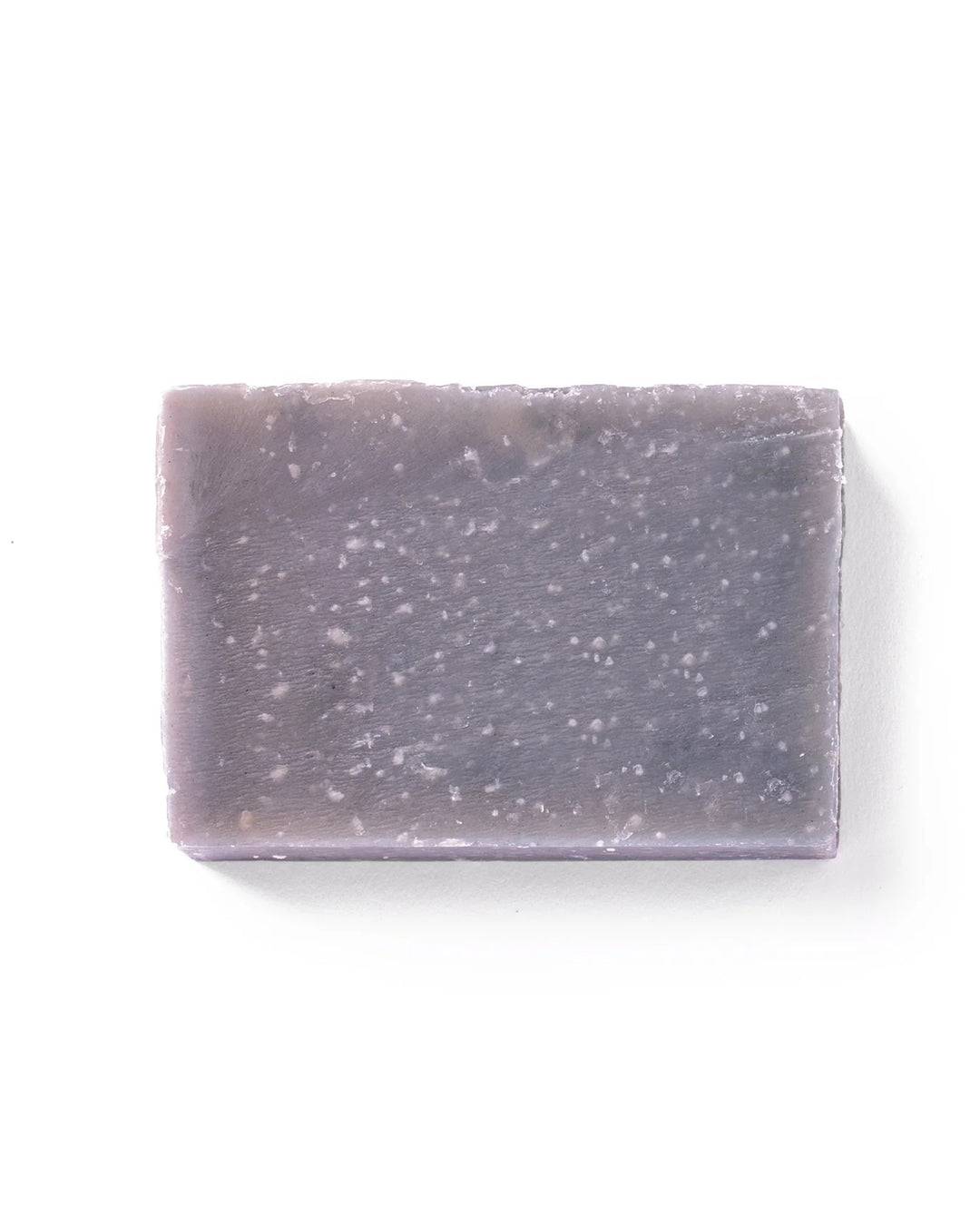 Purple speckled soap bar on a white background
