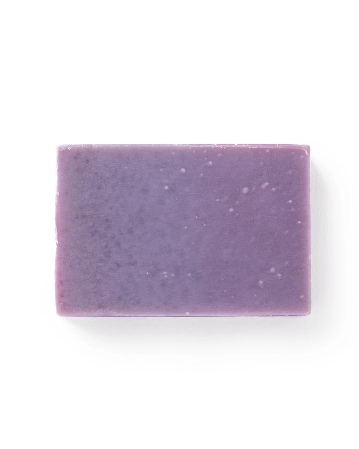 Purple soap bar on a white background