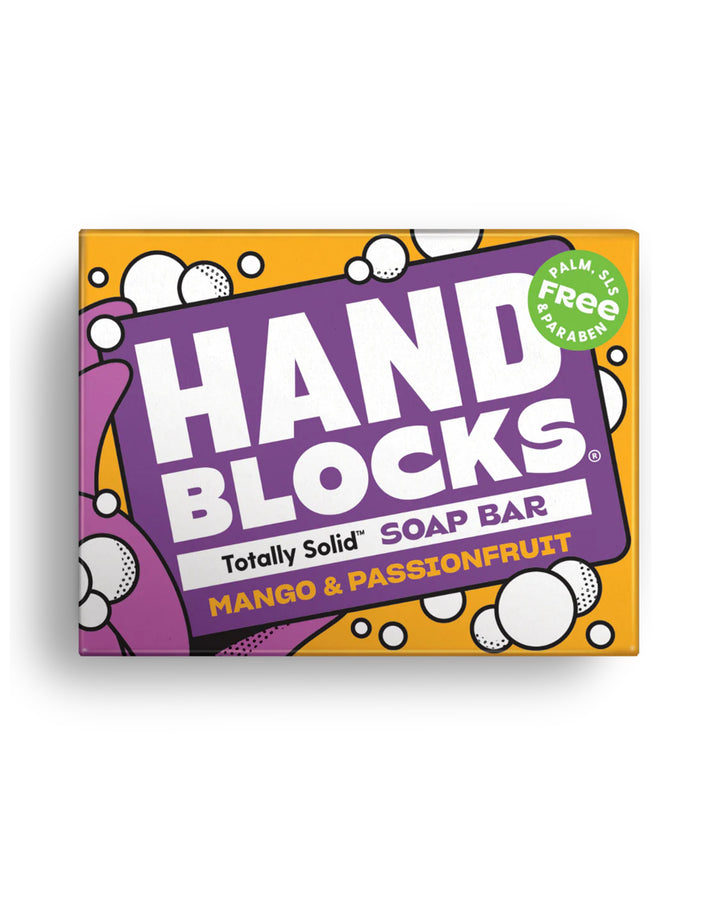Box of Hand Blocks soap bar with purple and orange design on a white background