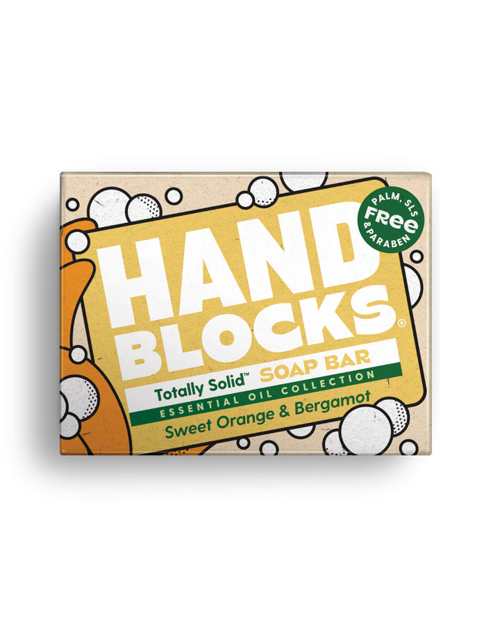 Hand Blocks soap bar packaging with a yellow and brown design on a white background