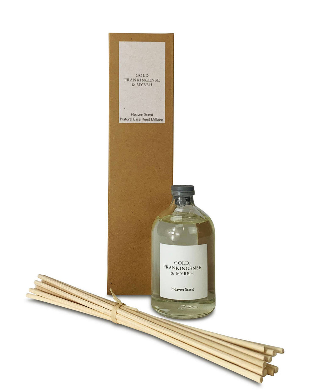 A bottle of 'Gold Frankincense & Myrrh' diffuser with reeds and a cardboard box on a white background.