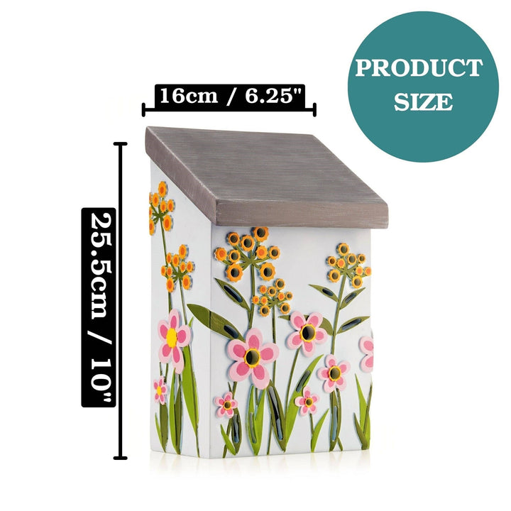 Small bug house with floral design and measurements on a white background