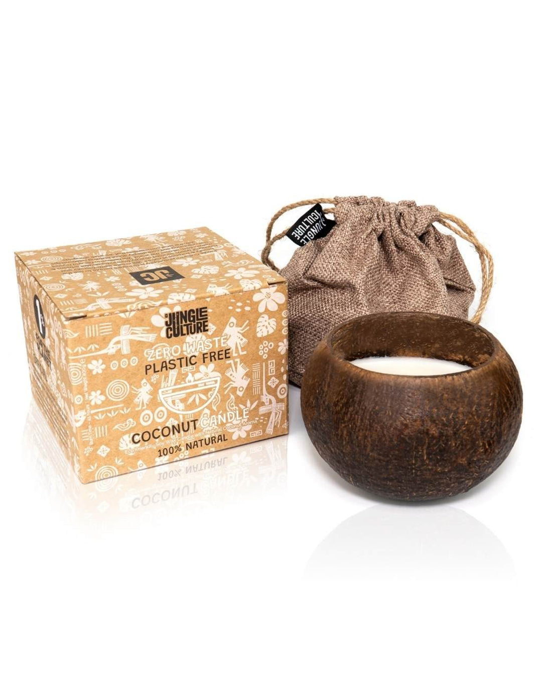 Coconut candle in a bowl with packaging and drawstring bag on a white background