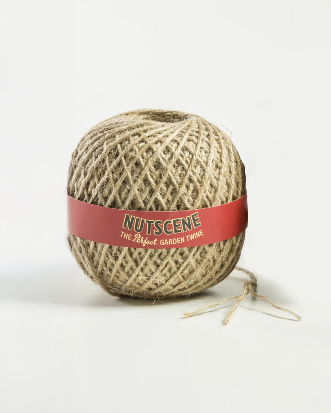 Ball of jute twine with a red Nutscene label on a white background
