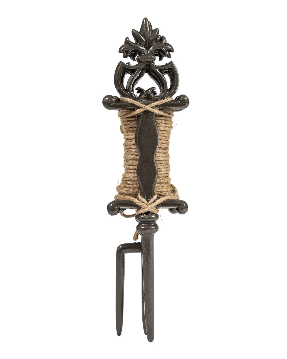 Decorative metal tool with intricate design and rope wrapping on a white background