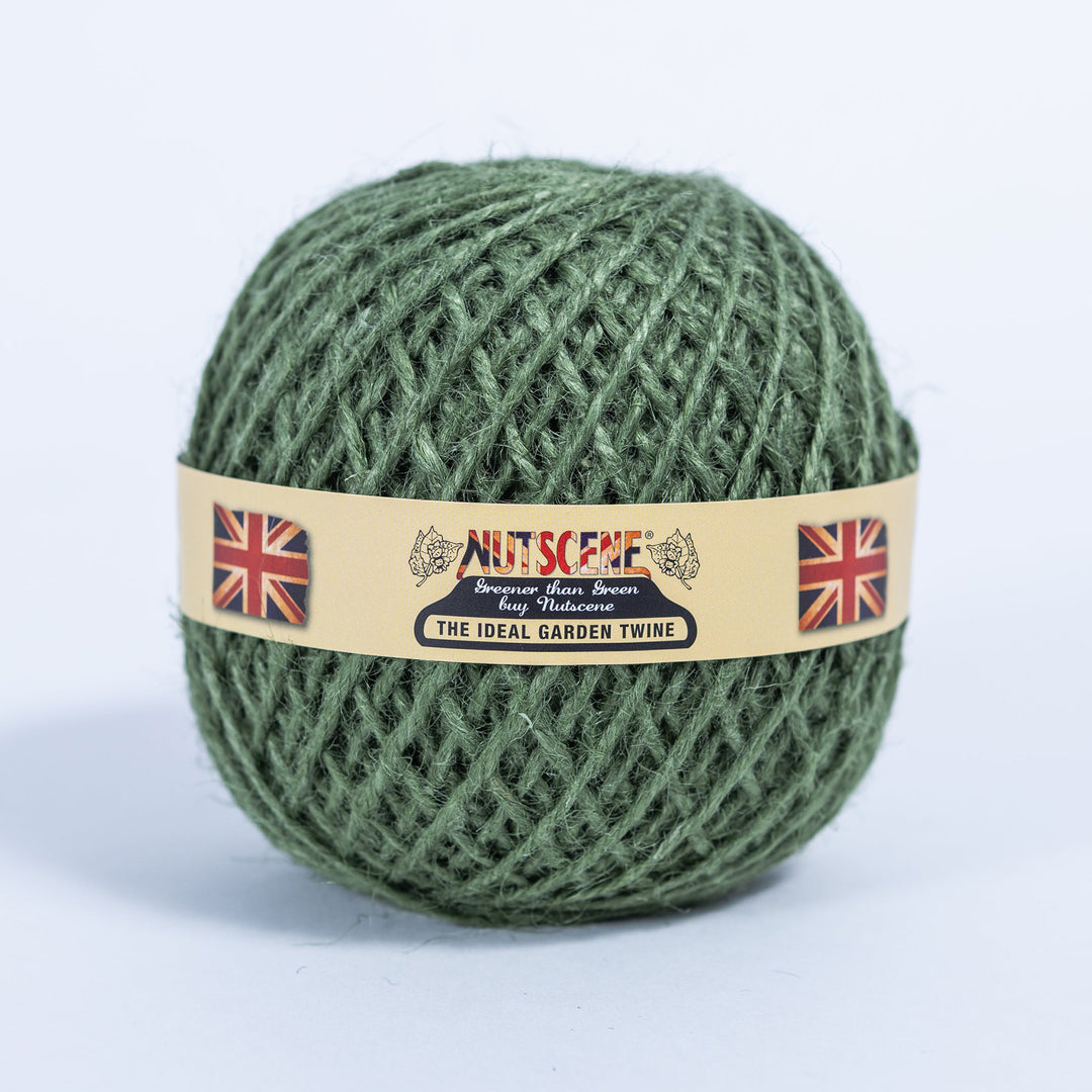 Ball of Nutscene green jute garden twine with the Nutscene paper band, the colour supplied with this wooden twine holder
