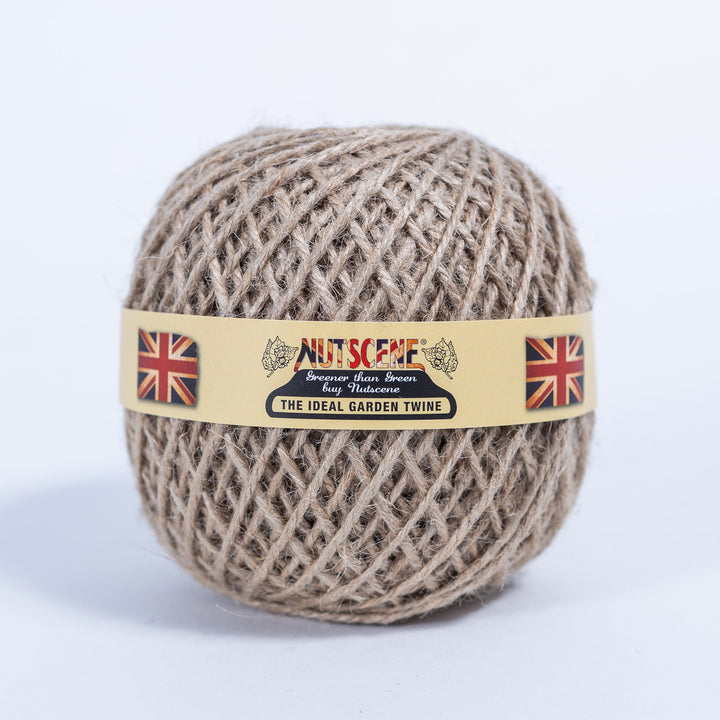 Ball of Nutscene natural jute garden twine with the Nutscene paper band, the colour supplied with this wooden twine holder