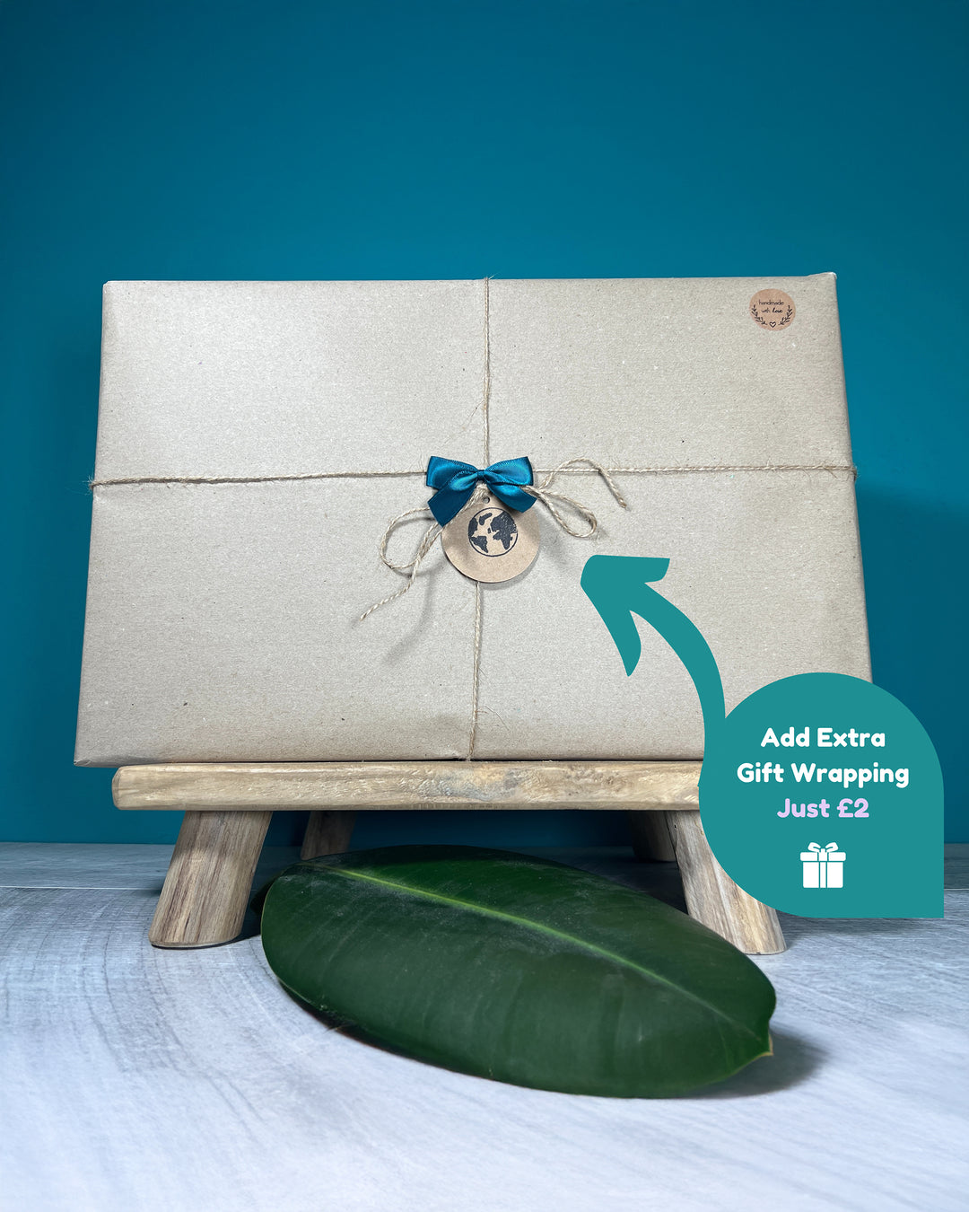 Gift box with a blue bow on a stand against a blue background