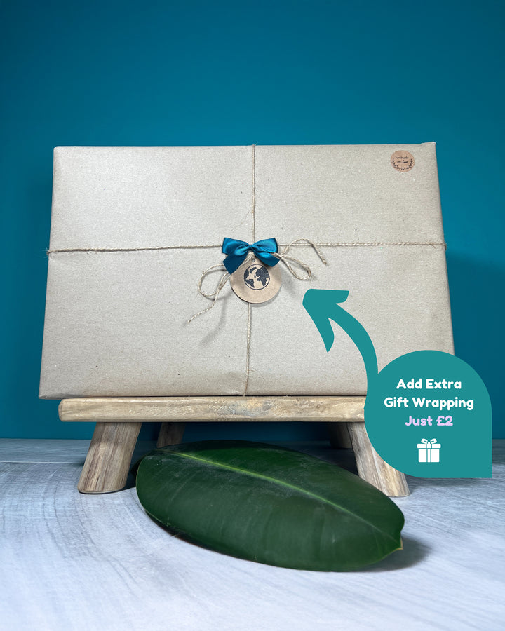 Gift box with a blue bow on a stand against a blue background
