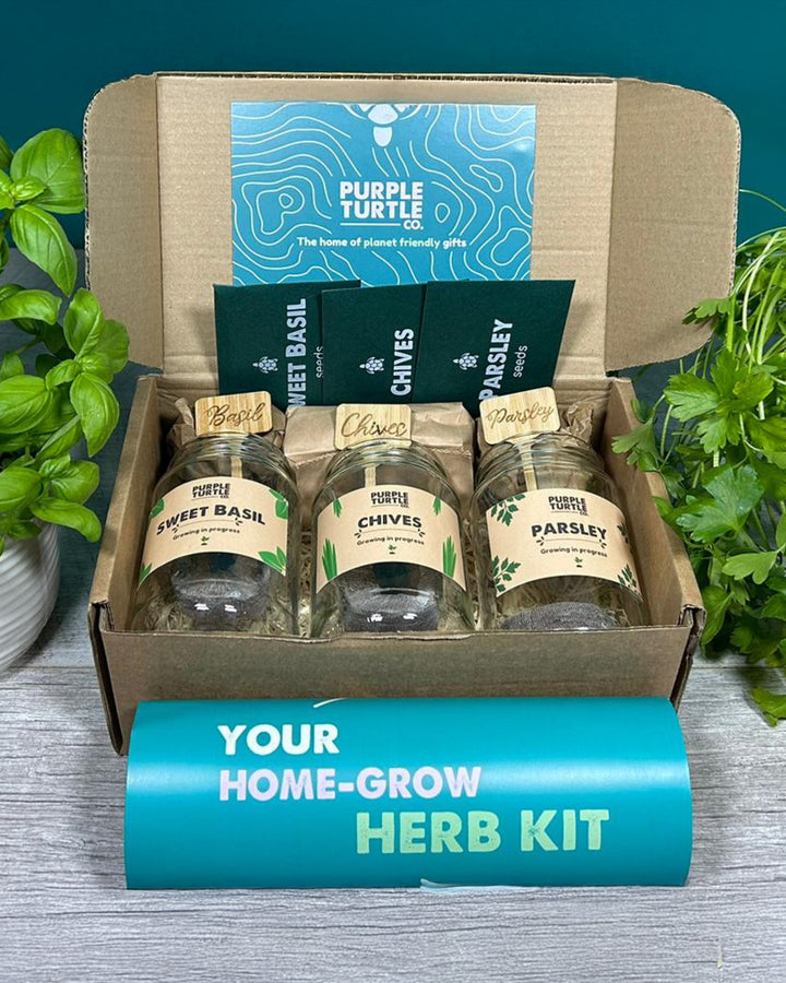 Home-grow herb kit with jars of dried herbs and branded packaging.