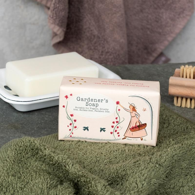 Gardener's soap bar with packaging on a towel