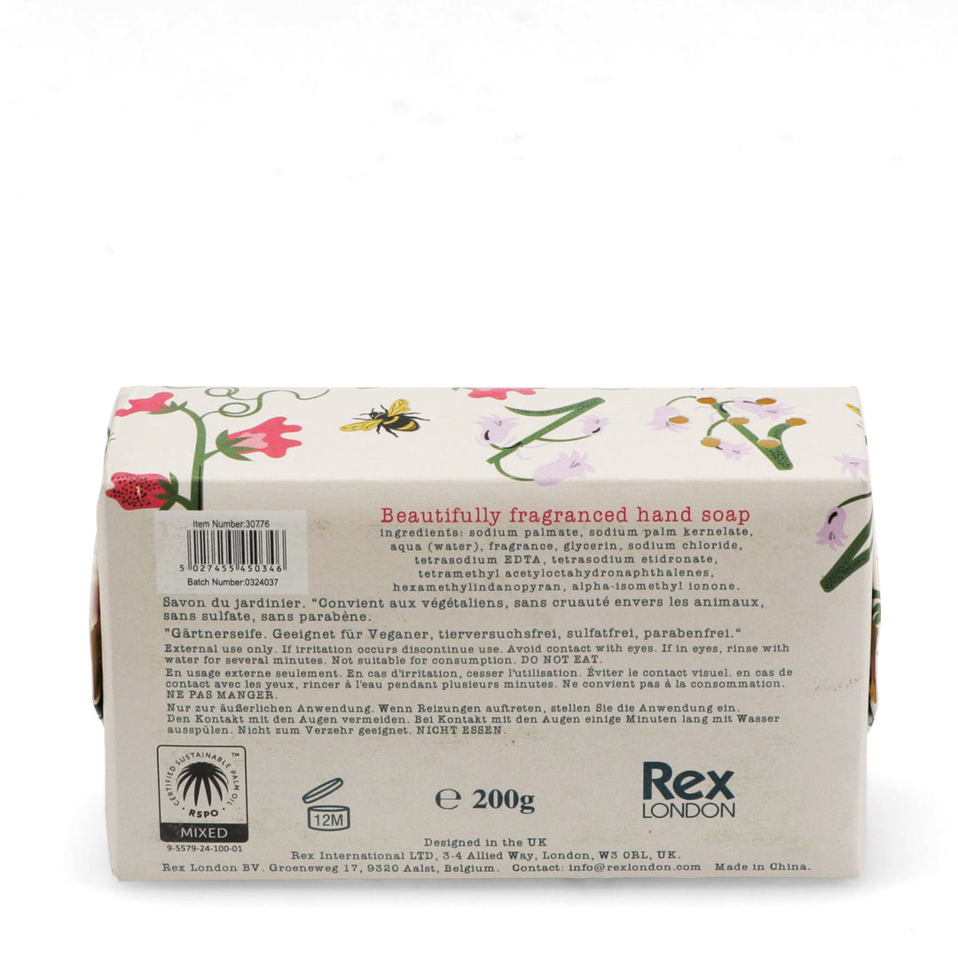 Back of a soap bar packaging with floral design and Rex London branding