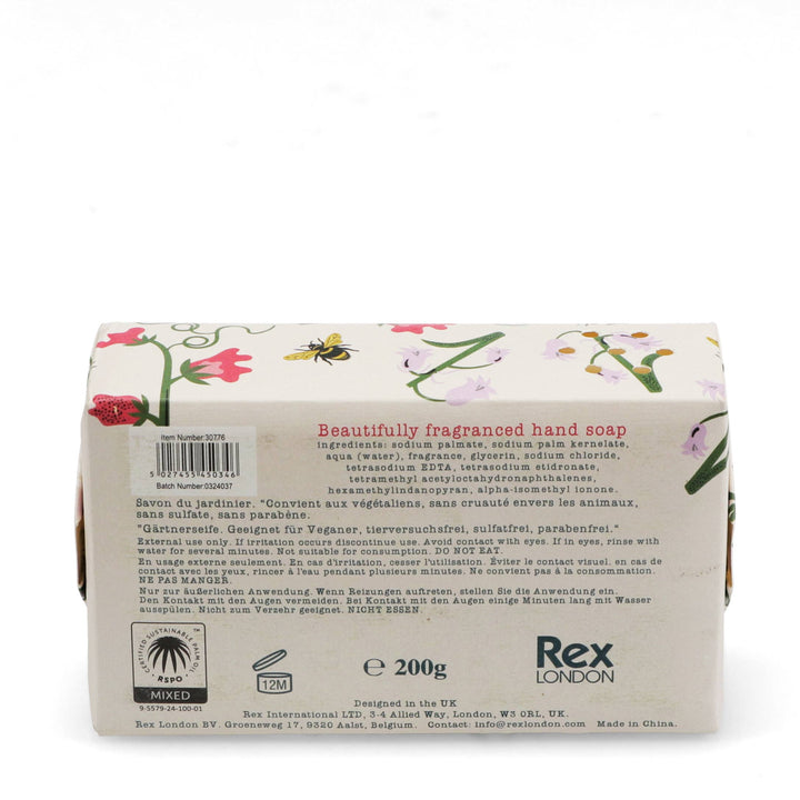 Back of a soap bar packaging with floral design and Rex London branding