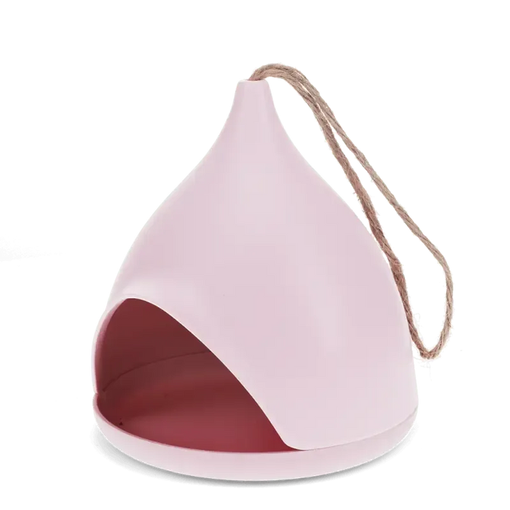 Pink bamboo fibre bird feeder showing the open feeding tray