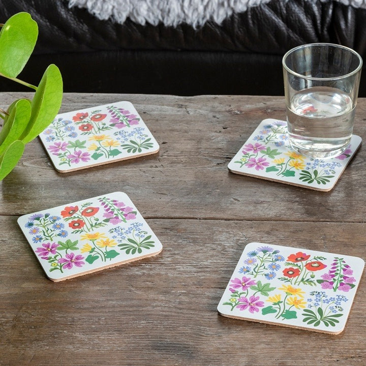 Wild Flowers coaster styled on a table with a cup of tea