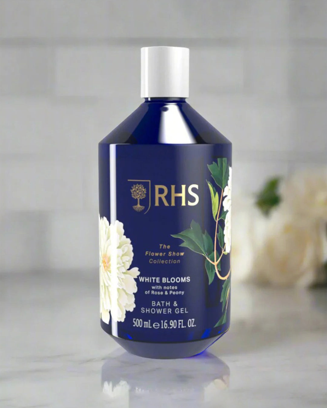 Bottle of RHS bath and shower gel with floral design on a neutral background