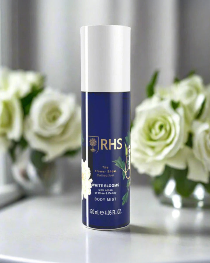 RHS body mist bottle with white flowers in the background