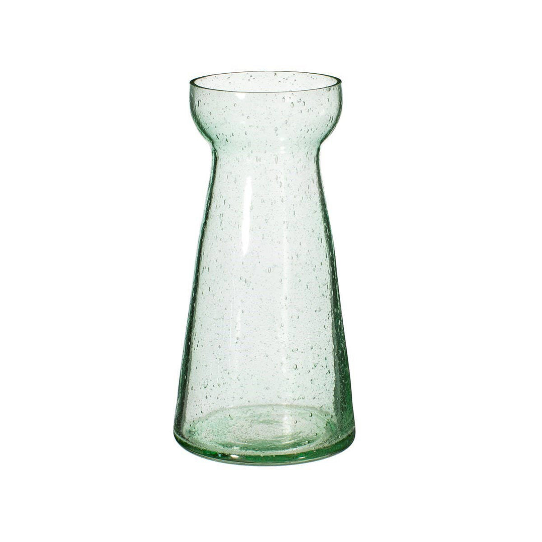 Green glass vase with a textured surface on a white background