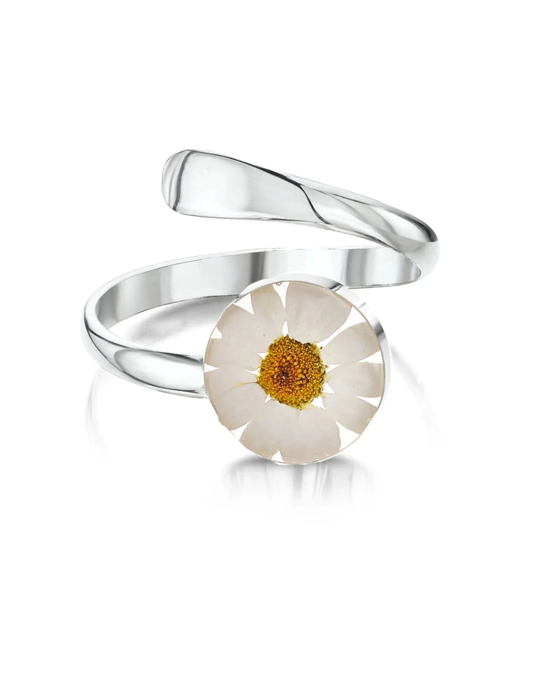 Silver ring with a white flower in the center on a white background