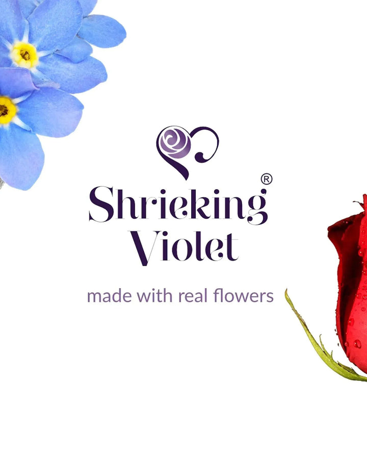 Shrieking Violet logo with blue and red flowers on a white background