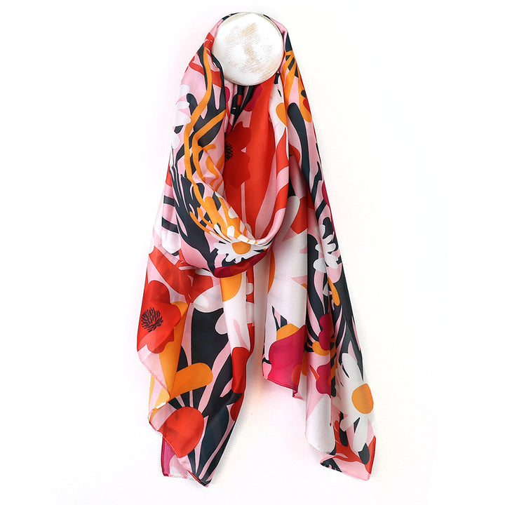 Colorful floral scarf with a white pearl on a white background