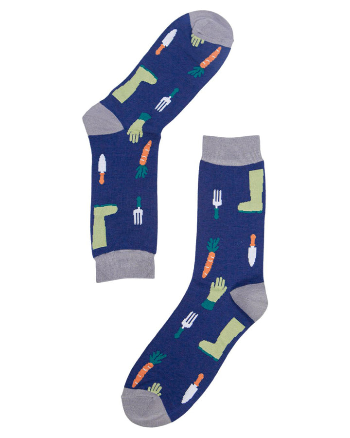 Pair of socks with gardening-themed design on a white background