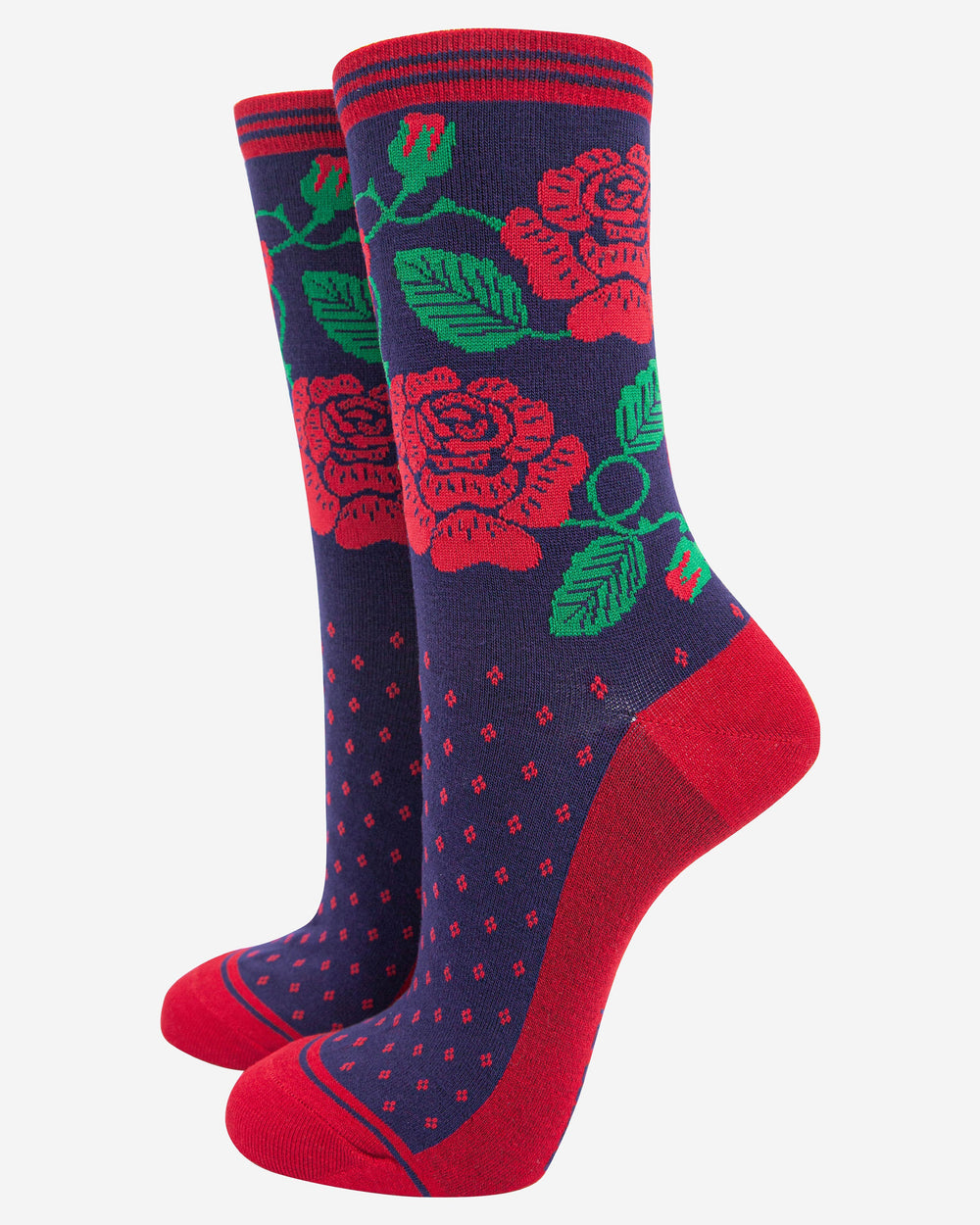 Pair of socks with red and green floral patterns on a navy background