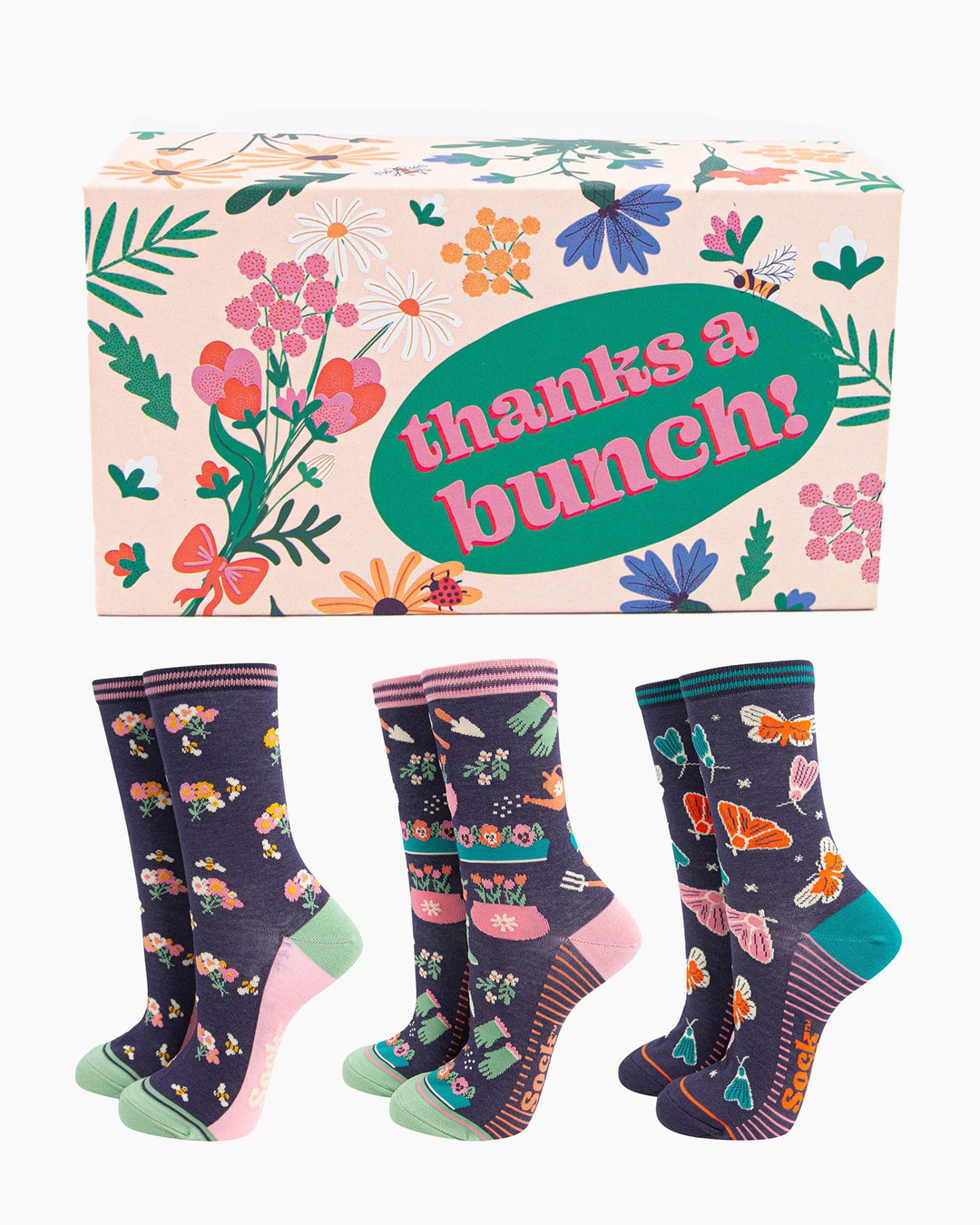 Three pairs of floral-patterned socks with a decorative box labeled 'thanks a bunch!' on a white background.