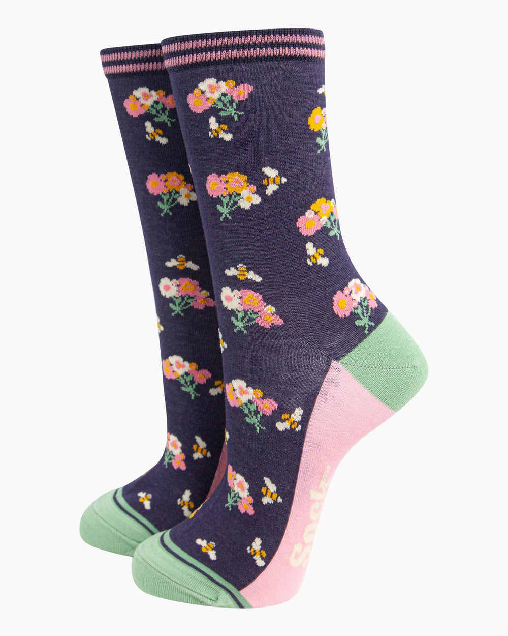 Pair of socks with floral pattern and bee designs on a white background