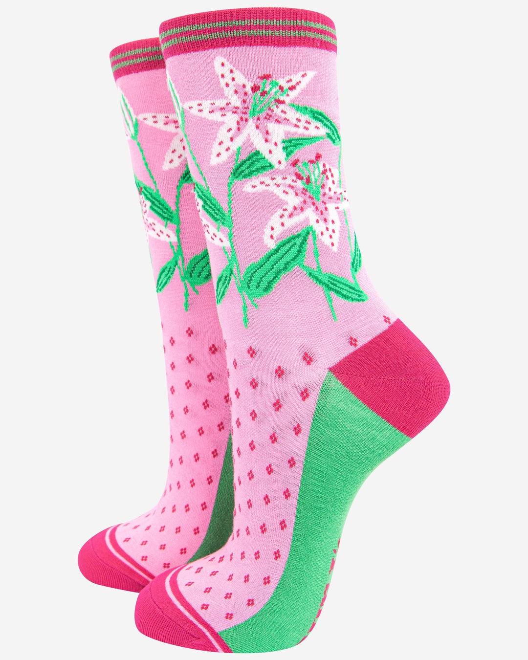 Pair of pink knee-high socks with floral design on a white background