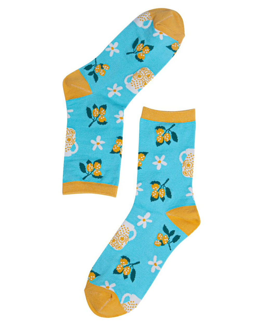 Pair of blue socks with yellow accents and floral patterns on a white background