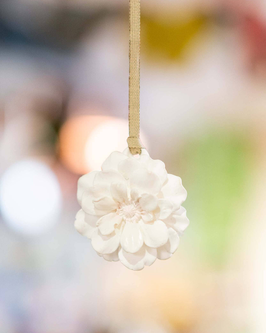 White flower ornament on a blurred background