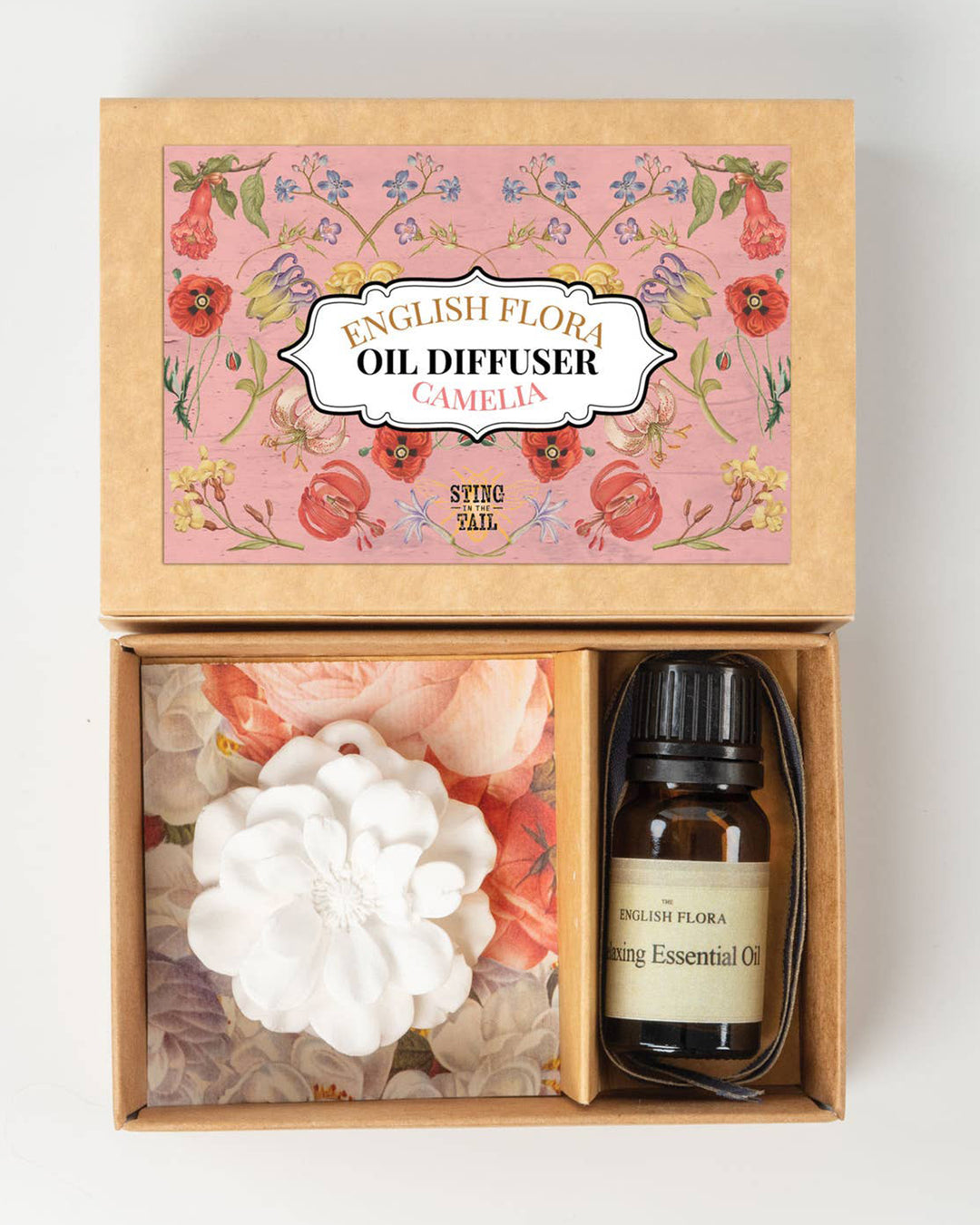 English Flora oil diffuser set with floral packaging on a white background