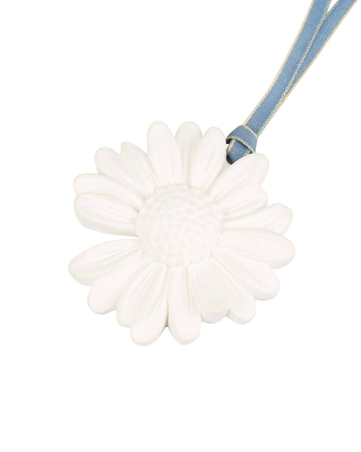 White flower-shaped bath pouf with a blue strap on a white background