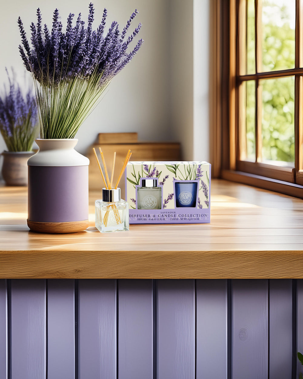 Lavender diffuser, candles, and packaging on a wooden surface with a window in the background.
