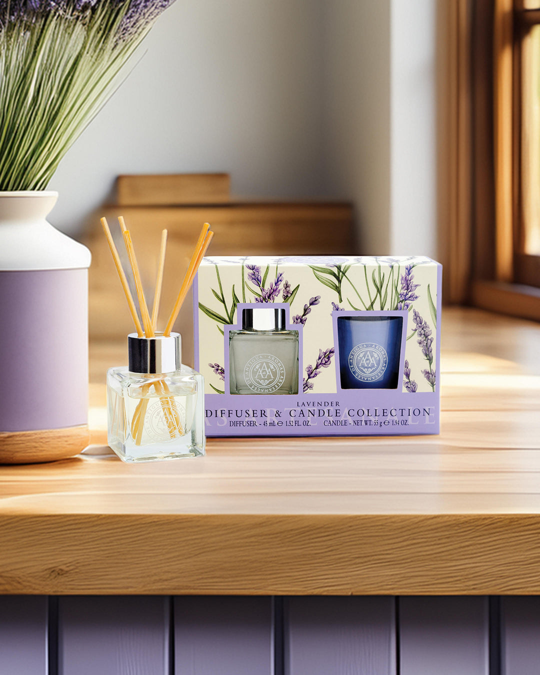 Lavender diffuser set on a wooden surface with a box labeled 'Lavender Collection'.