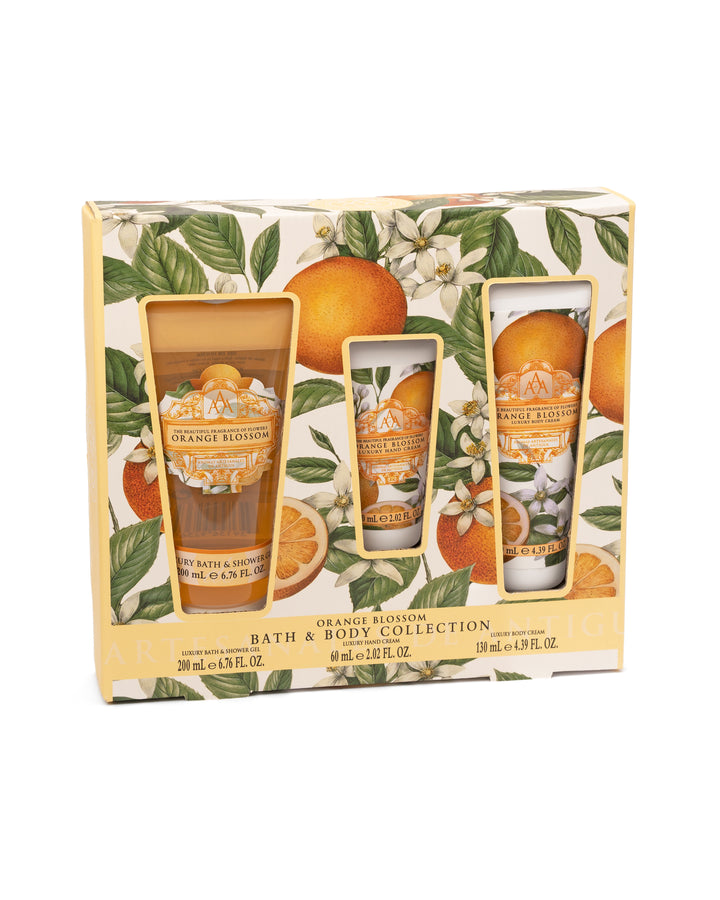 Orange Blossom bath and body collection with packaging featuring oranges and leaves.