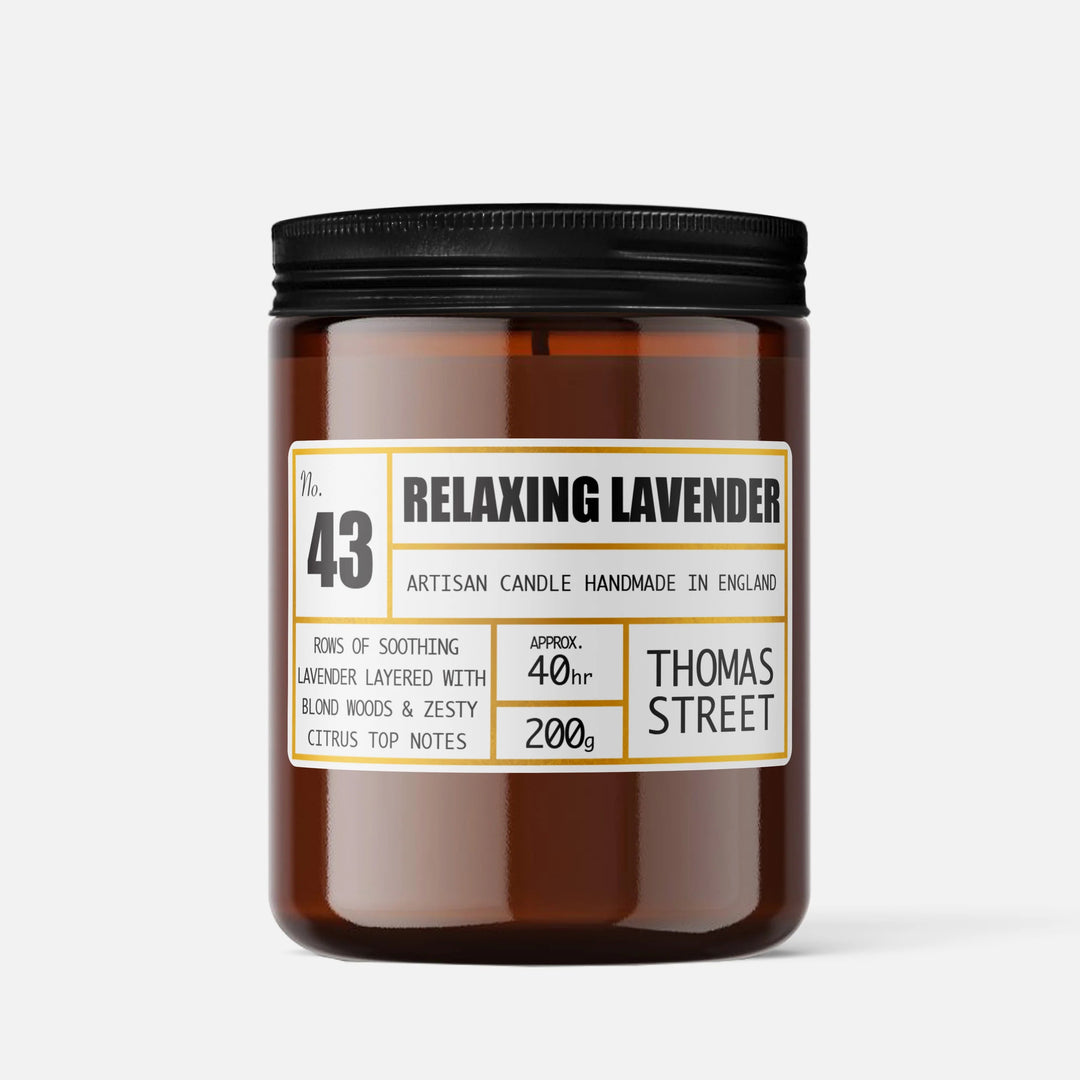 Brown candle with a label on a white background