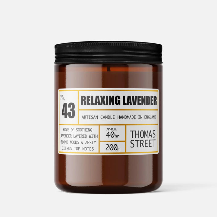 Brown candle with a label on a white background