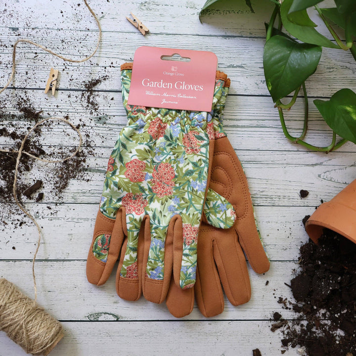 Floral-patterned gardening gloves with a brown background
