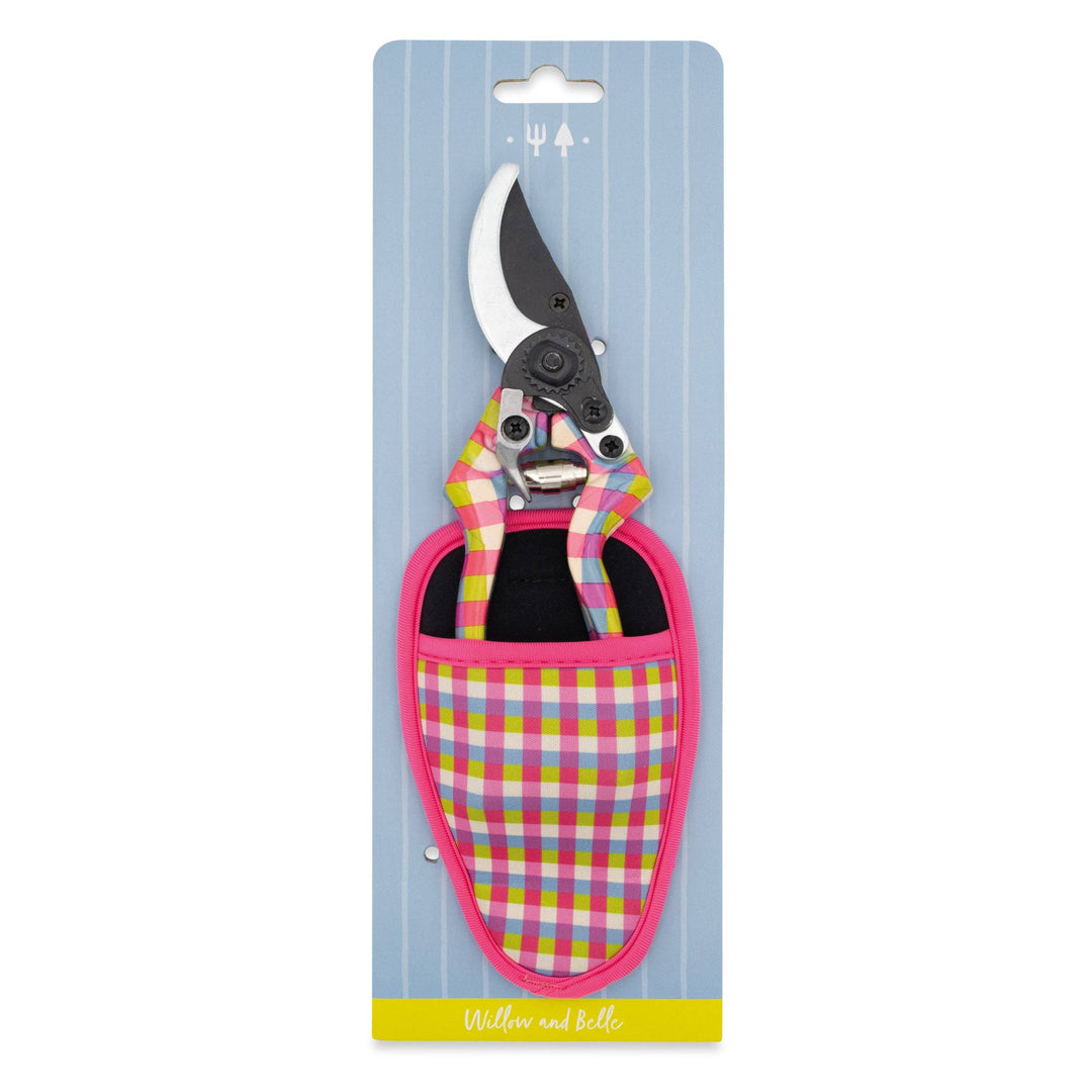 Gardening shears with a colorful case on a blue striped background