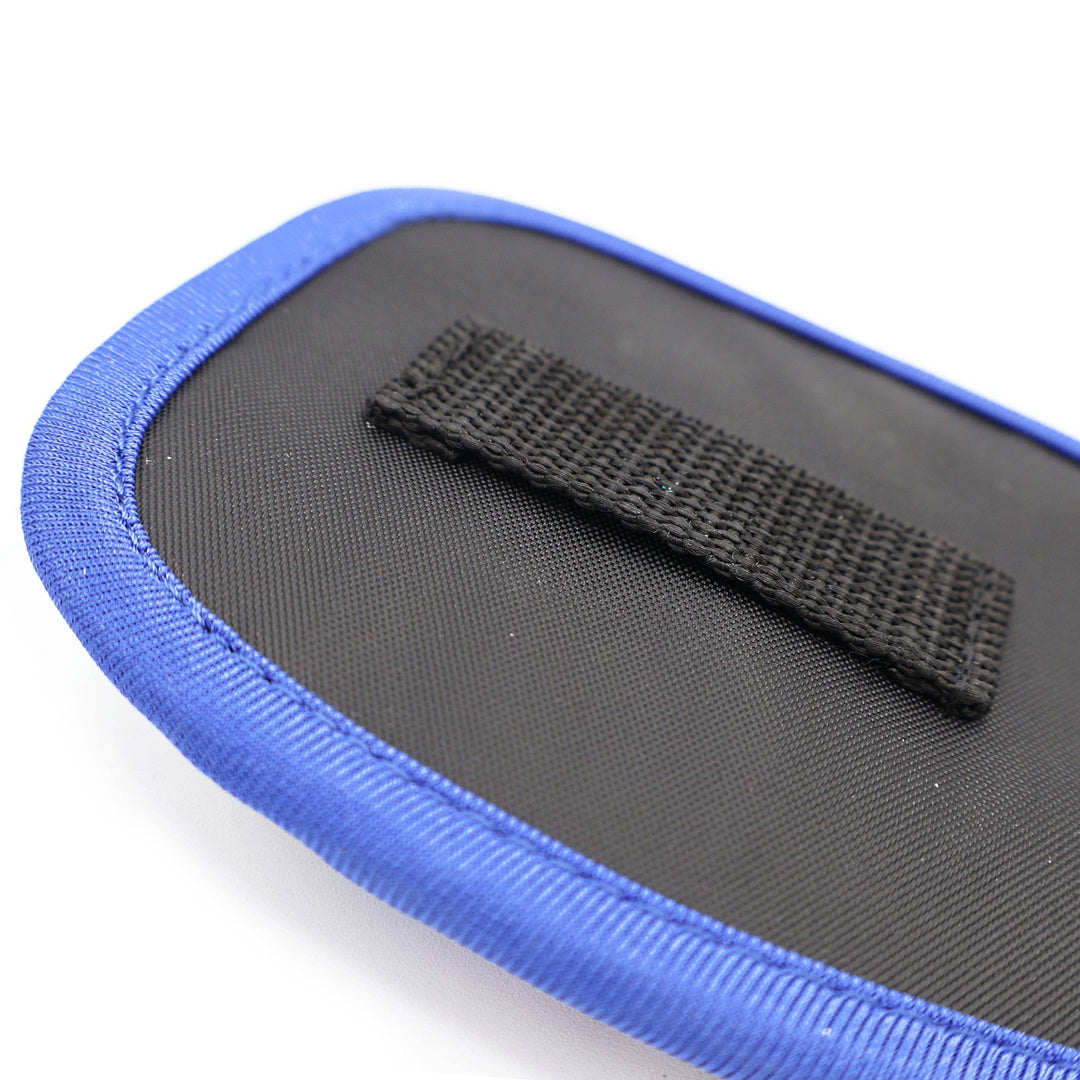 Black rectangular strap on a blue and black cushioned pad with a white background