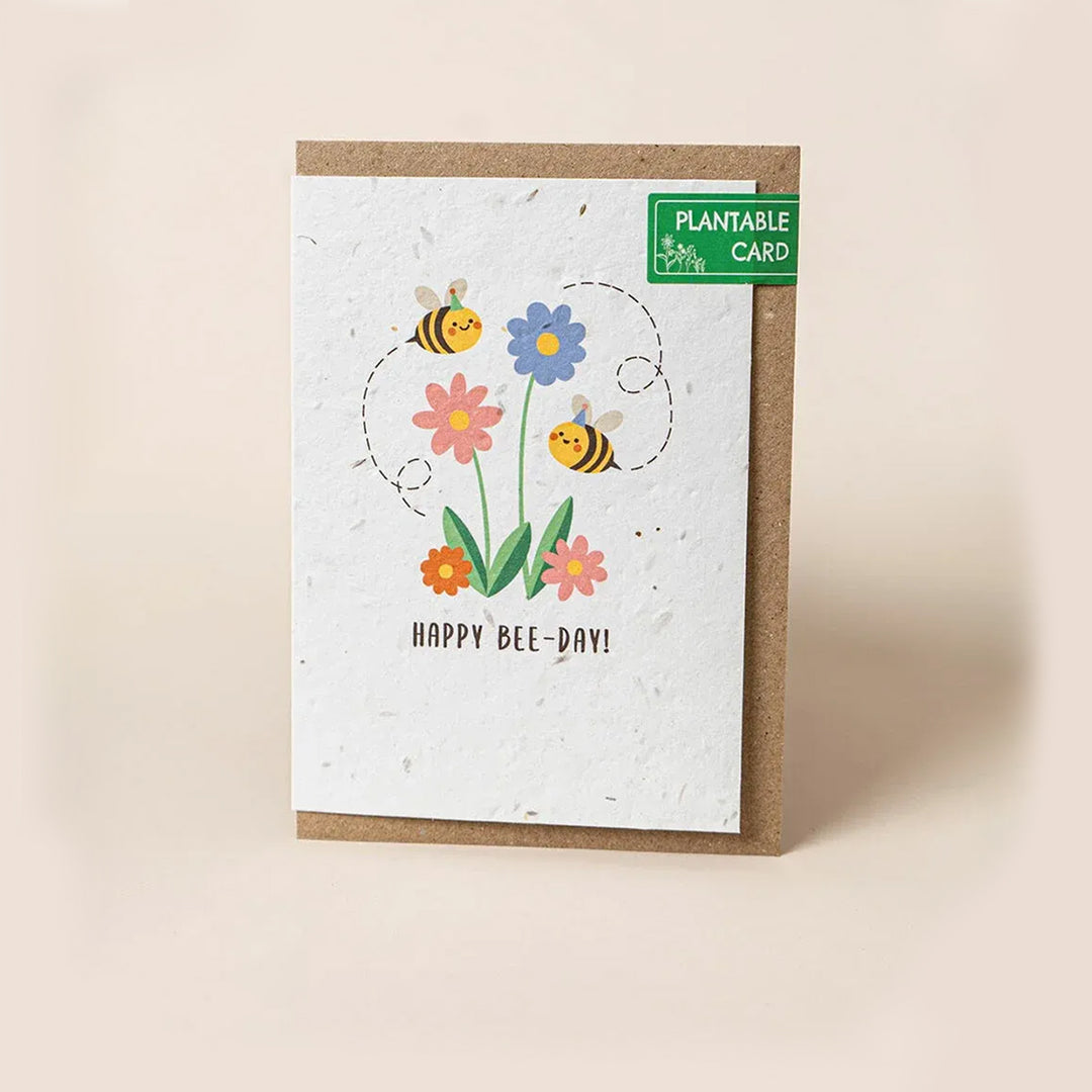 Plantable card with bees and flowers on a beige background