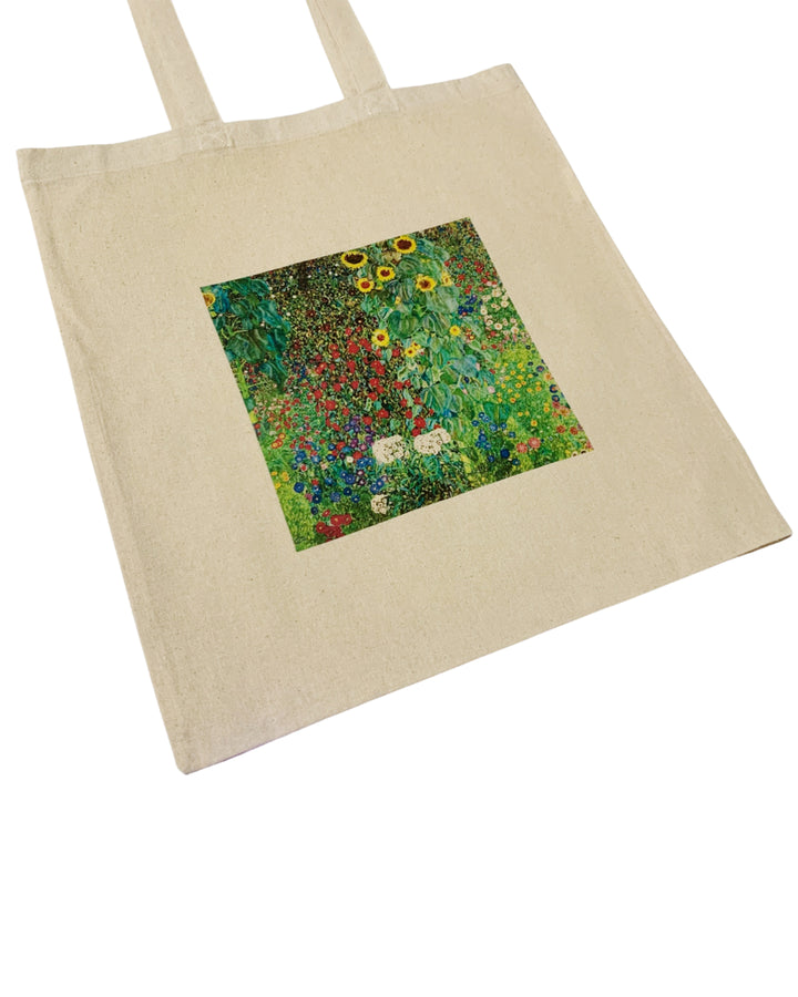 Beige tote bag with a colorful floral design on a white background